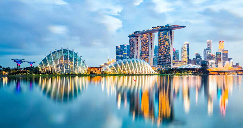 Singapore City, Singapore - July 17, 2015: Marina Bay is a bay near Central Area in the southern part of Singapore, and lies to the east of the Downtown Core. The area surrounding the bay itself, also called Marina Bay